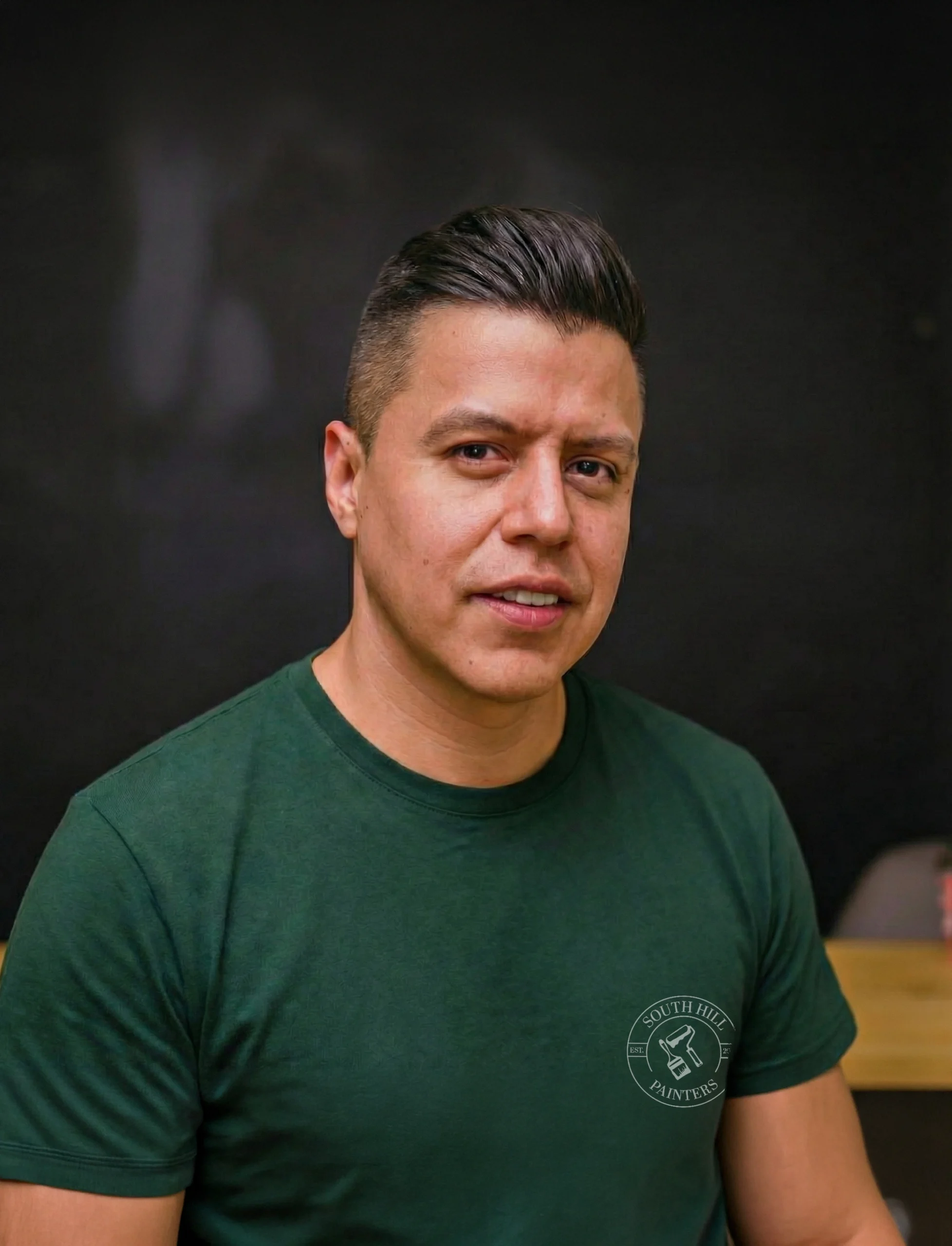 Ariel, founder of South Hill Painters, overseeing a commercial painting project in Toronto.